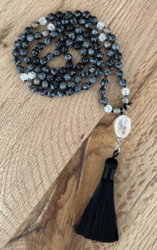 Mala with faceted rock crystal Buddha bead